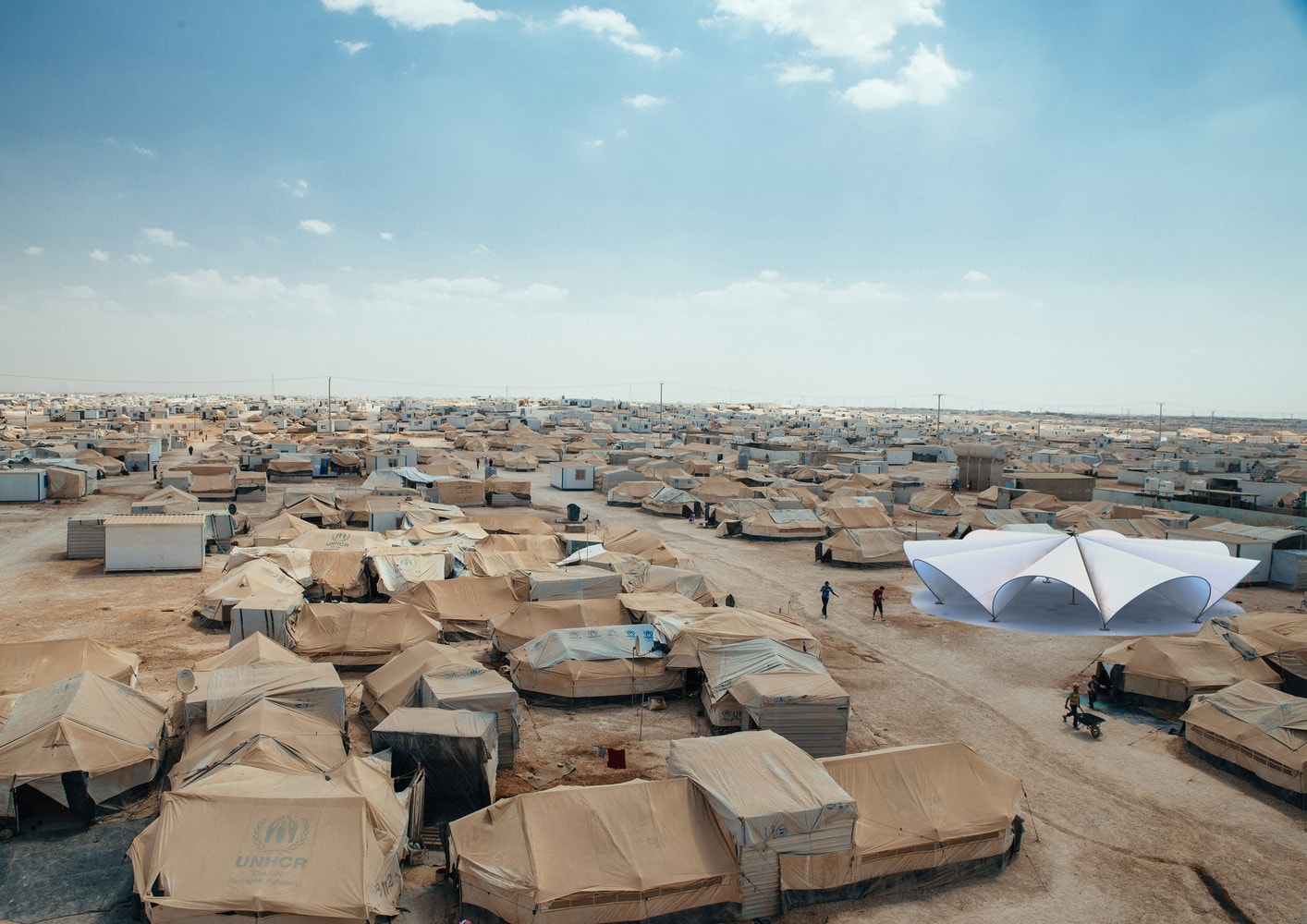 UNHCR refugee camp — humanitarian operations environment for Kerberos RIAB deployment