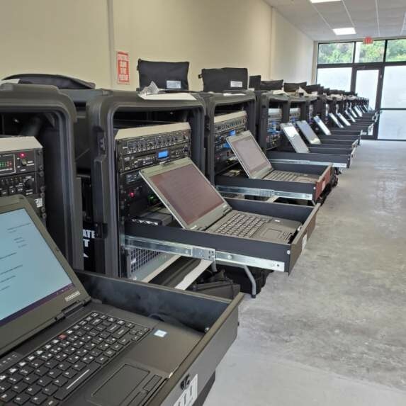 Kerberos RIAB final test and training facility — row of deployed broadcast systems